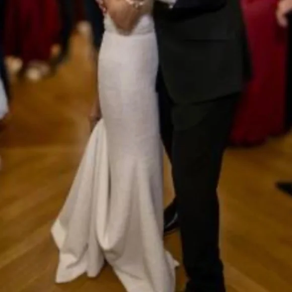 Two bridal gowns in excellent condition.Plus shoes.